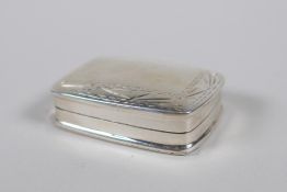 A 925 silver pill box with chased deco to the cover, 1½"