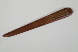 A wood letter opener, bears label 'From the teak of H.M.S. Iron Duke, Admiral Jellicoes Flag Ship,