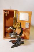 E. Leitz, Wetzlar, brass microscope, No 269602 in a lacquered oak case, 13" x 9" x 7"