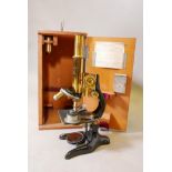 E. Leitz, Wetzlar, brass microscope, No 269602 in a lacquered oak case, 13" x 9" x 7"