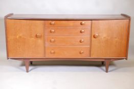 A mid century 'Volany' teak and afromosia sideboard by A. Younger Ltd, with bow shaped top over