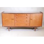 A mid century 'Volany' teak and afromosia sideboard by A. Younger Ltd, with bow shaped top over