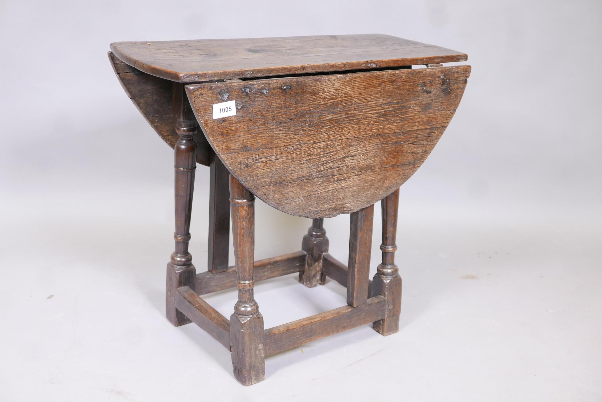 An early C18th oak gateleg table of small proportions, adaptions, 24"  x 12" x 21"