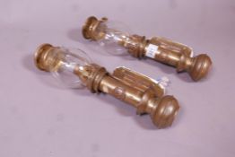 A pair of reproduction White Star Line ship's brass bulkhead lights, 13" high