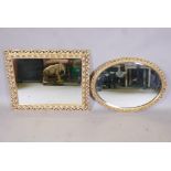 A pierced gilt wall mirror and another with bevelled glass, largest 29" x 23"