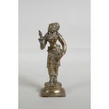 An Indian polished bronze female deity, 6" high