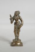 An Indian polished bronze female deity, 6" high