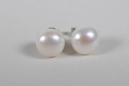 A pair of large freshwater pearl stud earrings on 925 silver posts