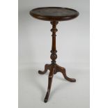 A mahogany pedestal wine table, 20" high x 10" diameter