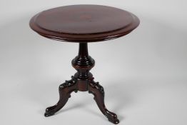 A miniature rosewood circular occasional table on turned column and carved tripod base, 12½" x