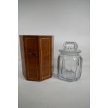 A brass inlaid octaganol mahogany box containing a large glass jar, A/F, 10" high