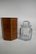 A brass inlaid octaganol mahogany box containing a large glass jar, A/F, 10" high