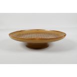 A Song style brown ground pottery dish, with a lobed rim & raised pot, the bowl with chased