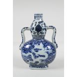 A Ming style blue & white porcelain two handled flask with lotus flower & dragon decoration, 4