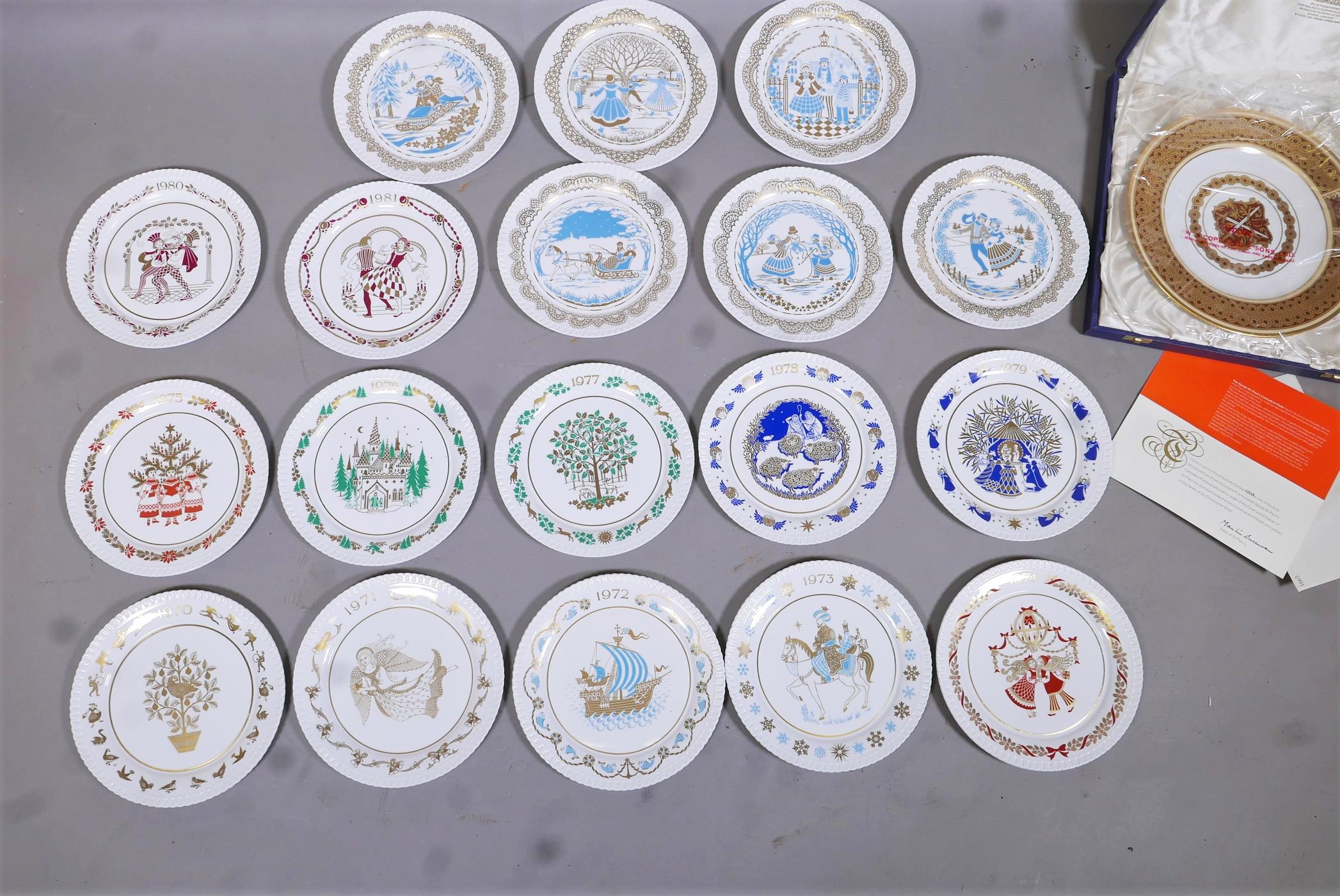 A set of Spode Christmas plates, from the First, 1970 to 1987, and a Spode limited edition St Paul's