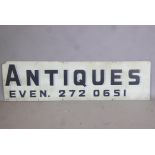 Architectural Salvage, a vintage hand painted 'Antiques' sign, 61" x 16½"