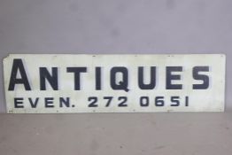 Architectural Salvage, a vintage hand painted 'Antiques' sign, 61" x 16½"
