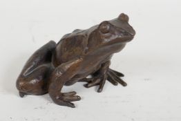 A bronze figurine of a frog, 2" high
