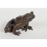 A bronze figurine of a frog, 2" high