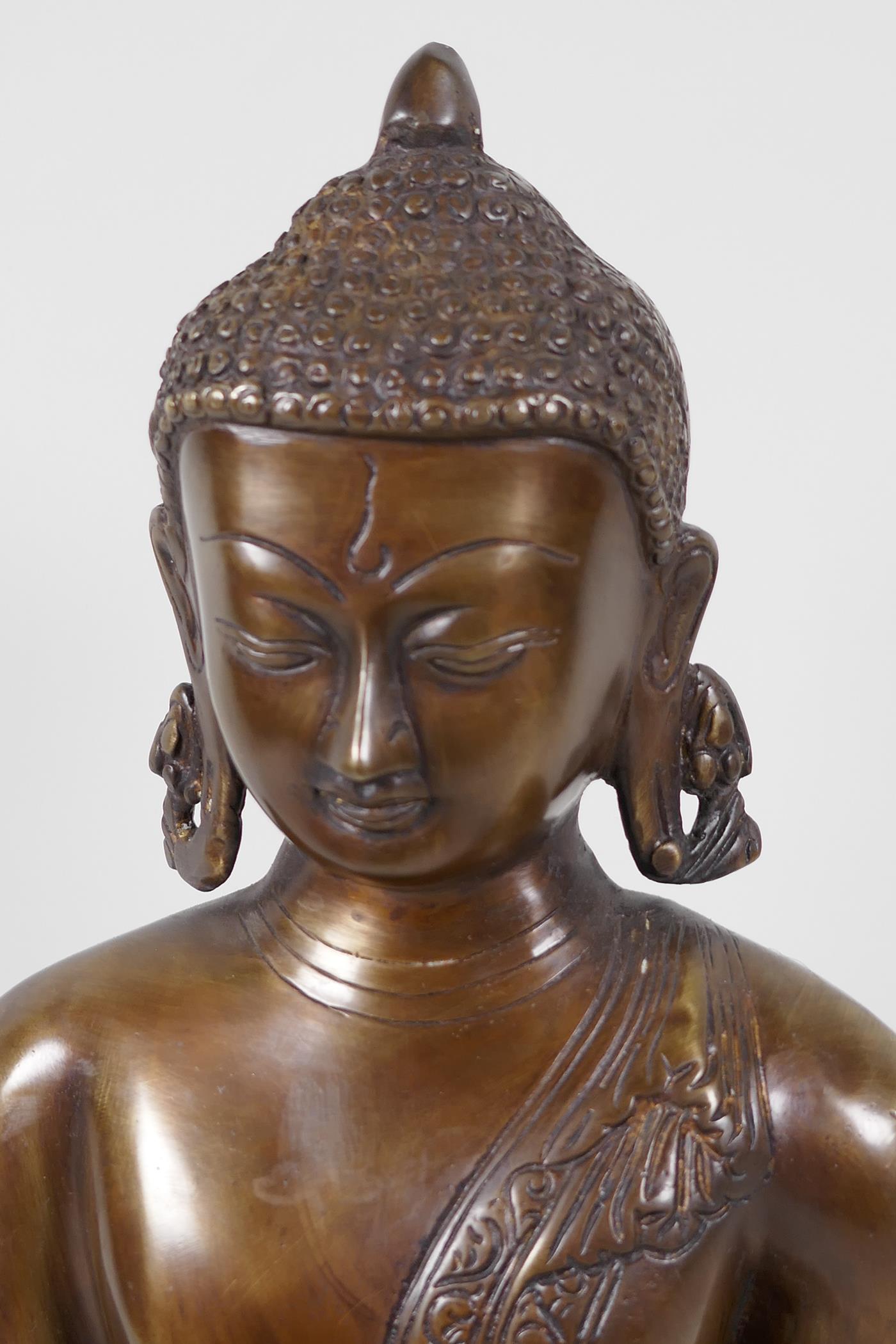 A Chinese bronze figure of Buddha, seated in meditation - Image 2 of 4