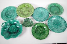 Five green Cabbage Leaf Majolica plates, together with a tazza and two leaf pattern serving