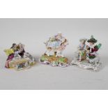 A Sitzendorph porcelain figure of a lady playing piano and her amorous admirer, together with a