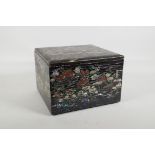 A Japanese Mother of Pearl inlaid black lacquer multi layer box, decorated with views of riverside