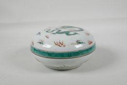 A Chinese Kangxi style famille vert porcelain box & cover, decorated with a dragon chasing the