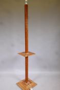 Art Deco walnut standard lamp with moulded decoration, 66" high