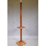 Art Deco walnut standard lamp with moulded decoration, 66" high