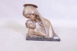 A terracotta bust of the Madonna and Child, mounted on a marble base, inscribed G. Carli, 13" high