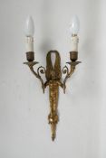 An ormolu two branch wall sconce of angelic form, 15"