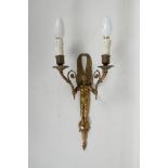 An ormolu two branch wall sconce of angelic form, 15"