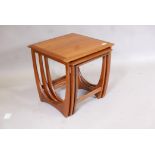 A mid century G-Plan teak 'Astro' nest of three tables, 20" x 20" x 20"