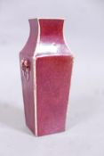 An antique Chinese ceramic vase with sang de beouf glaze, 8" high
