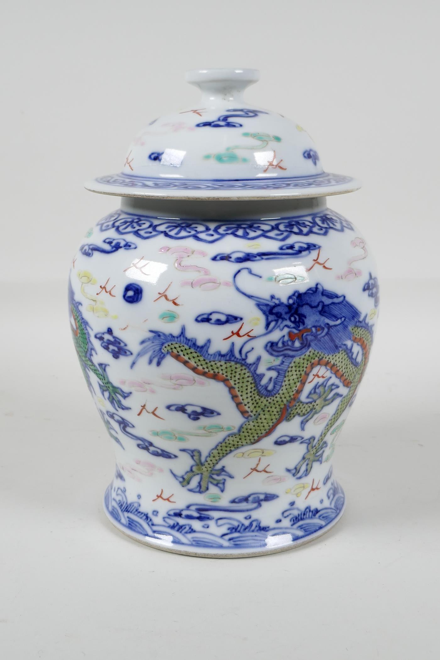 A Chinese polychrome porcelain meiping ginger jar & cover, decorated with dragons chasing the - Image 2 of 5