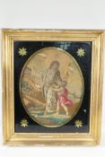 An early C19th woolwork of a mother and child approaching a hilltop temple, in an eglomise mount and