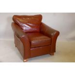 An M&S brown leather club chair