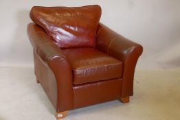 An M&S brown leather club chair