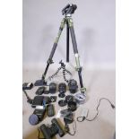 A quantity of photography accessories, Canon and Polaroid lenses, Manfroto tripod etc