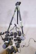 A quantity of photography accessories, Canon and Polaroid lenses, Manfroto tripod etc