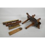 A C19th moulding plane by Buck & Hickman Ltd, London, and four vintage levels and a brass mounted