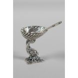 A miniature 925 silver salt & matching spoon, in the form of a dolphin holding a clam shell, 1½"
