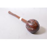 An antique hardwood knobkerrie with carved shaft and good patina, 16" long