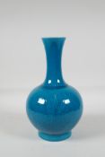A Chinese teal glazed porcelain vase with waisted neck and underglaze incised dragon decoration, 6
