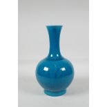 A Chinese teal glazed porcelain vase with waisted neck and underglaze incised dragon decoration, 6