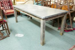 A mid century industrial zinc topped work table with bolt on legs, 80" x 36" x 30"