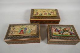 Three graduated Persian micro mosaic cigarette boxes, the covers painted with hunting, polo and