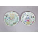 Two Chinese celadon glazed plates with enamel decoration, 9" diameter