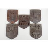 Five late C19th carved oak heraldic plaques, 9" x 7"